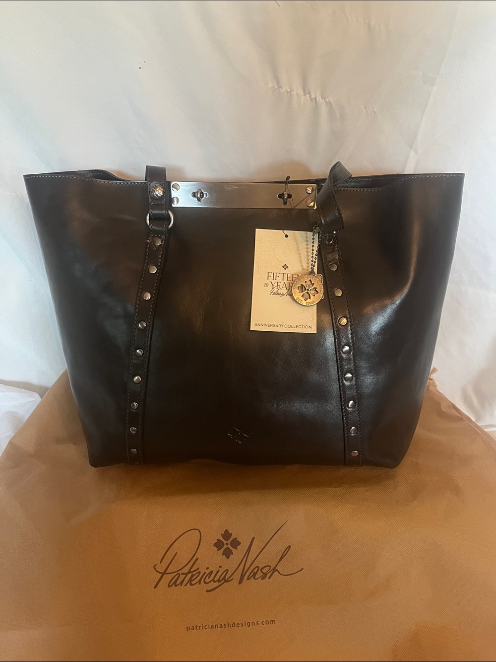 Patricia Nash Black Leather Studded Tote with Silver Bar Accent